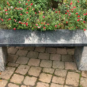 Epsom Two Tone Granite Garden Bench Large in a UK garden