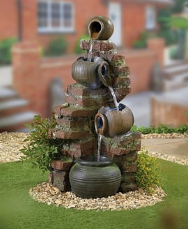 Rustic Flowing Jugs Self Contained Water Feature