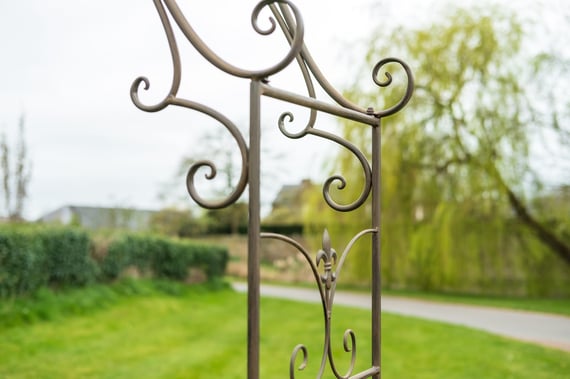 Heraldic Rusted Metal Garden Arch Trellising