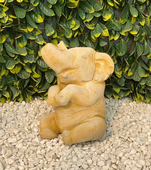 Sitting Elephant Stone Garden Ornament in Sandstone - close up view