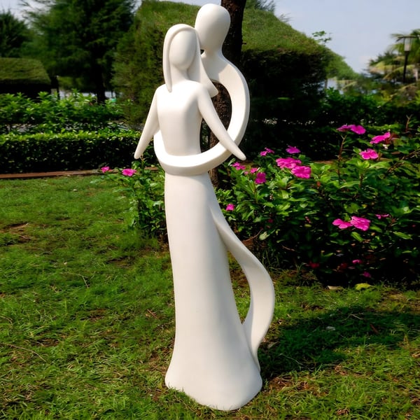 Small Infinite Love Garden Statue with two abstract entwined figures in a white finish